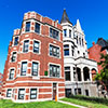 Apartment building and Victorian Greystone Mansion on Drexel Boulevard